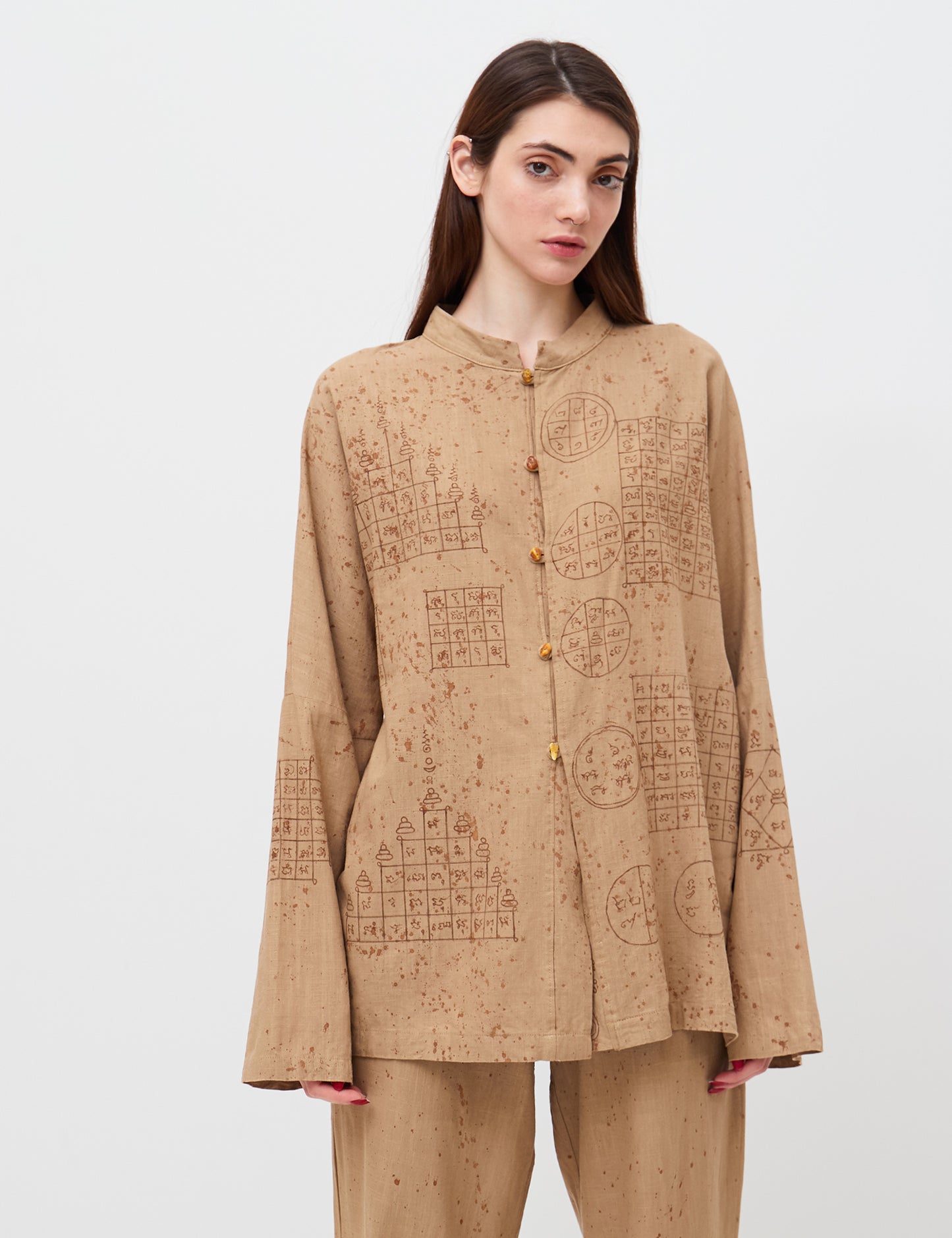 Oversize shirt with sacred symbols Sak Yant